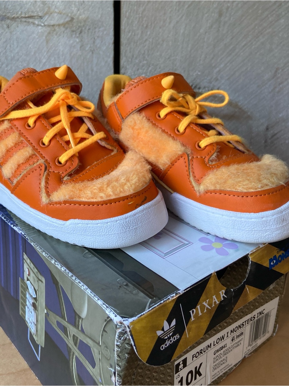 adidas Kids Monsters Orange Low-Top Fuzzy Sneakers
